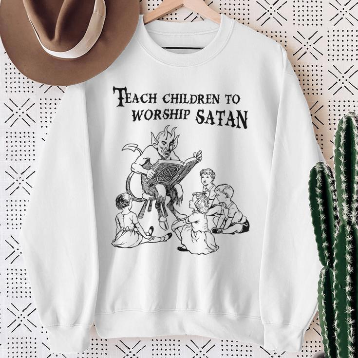 Teach Children To Worship Satan Satanic Demon Devil Book Sweatshirt Gifts for Old Women Teach Children To Worship Satan Satanic Demon Devil Book Sweatshirt Gifts for Old Women