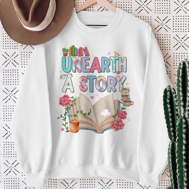 Unearth A Story Library Book Reading Program 2026 Summer Sweatshirt Gifts for Old Women Unearth A Story Library Book Reading Program 2026 Summer Sweatshirt Gifts for Old Women