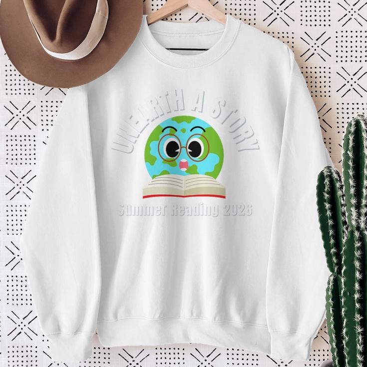 Unearth a Story Summer 2026 Reading Program Earth Read Book Premium Tri-Blend Sweatshirt Gifts for Old Women