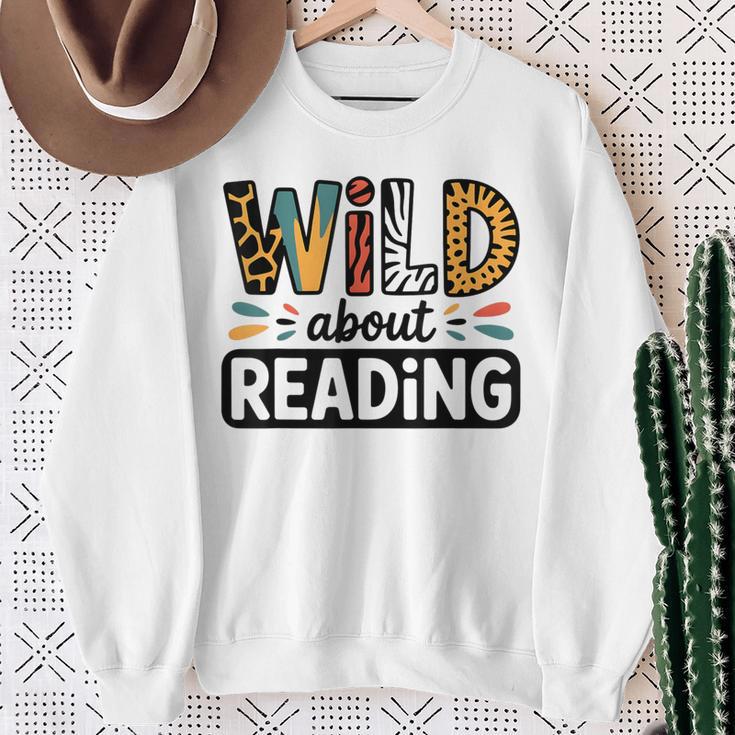 Wild About Reading Reading Books And Bookworm Library Day Sweatshirt Gifts for Old Women
