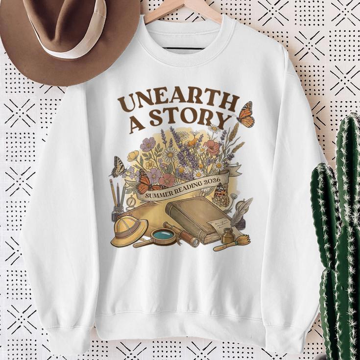 Women's Unearth A Story Summer Reading 2026 Flower Butterfly Book Sweatshirt Gifts for Old Women