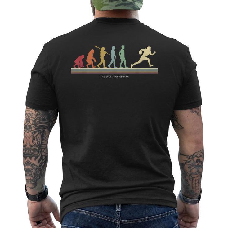 The Evolution Of Man アメリカンフットボール選手 メンズTシャツ バックプリント
