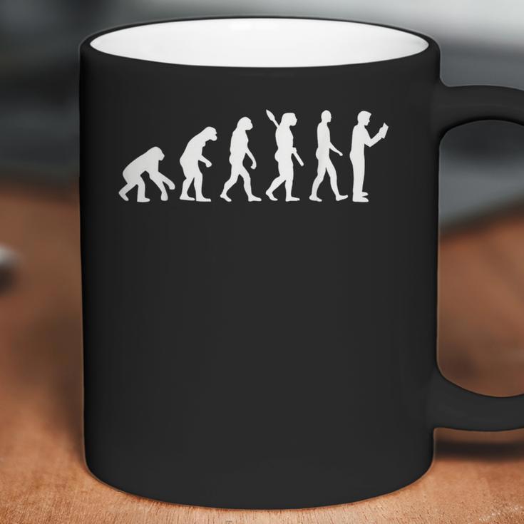 Evolution Reading Coffee Mug