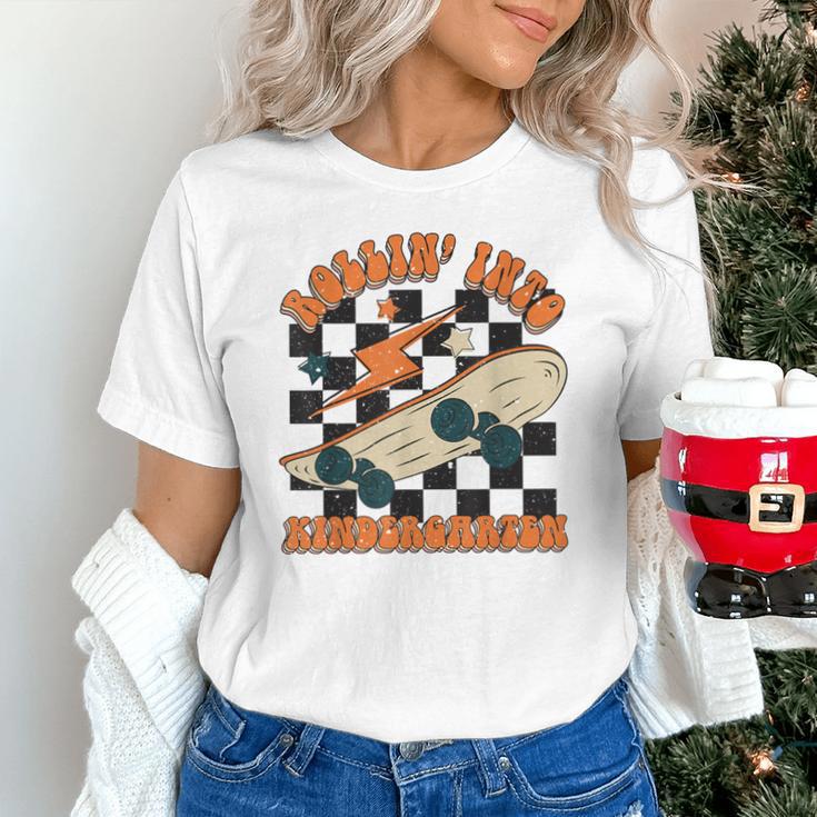 Rolling Into Kindergarten Retro Groovy Back To School Kids Unisex T-Shirt Rolling Into Kindergarten Retro Groovy Back To School Kids Unisex T-Shirt