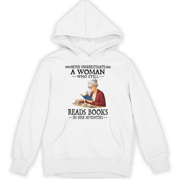 Never Underestimate A Woman Who Still Reads Books In Her Unisex Hoodie