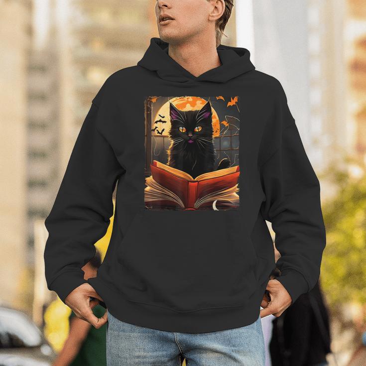 Halloween Cat Reading Books Spooky Cat Reader Teachers For Men Women Kids Unisex Hoodie