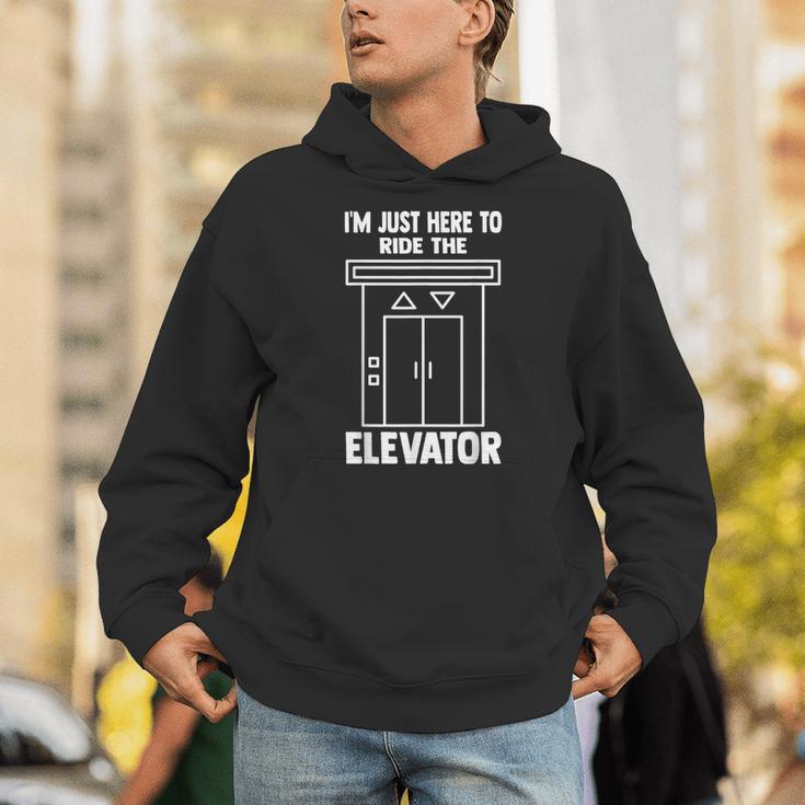 I'm Just Here To Ride The Elevator おもしろ引用エレベーター パーカー