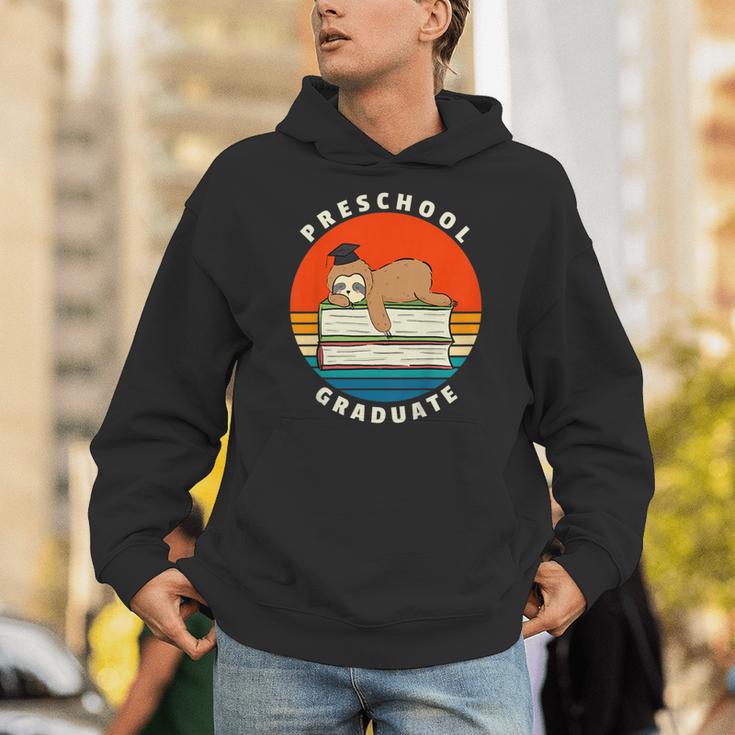 Kids Preschool Graduate Sloth Graduation Cap Sleeping On Books Unisex Hoodie