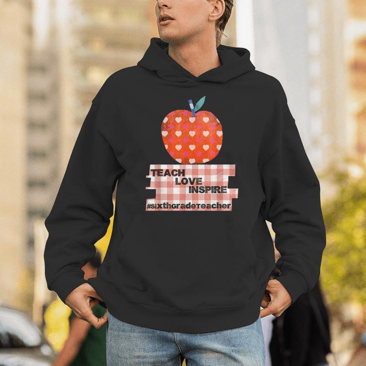 Teach Love Inspire Valentines Day Book 6th Grade Teacher Unisex Hoodie