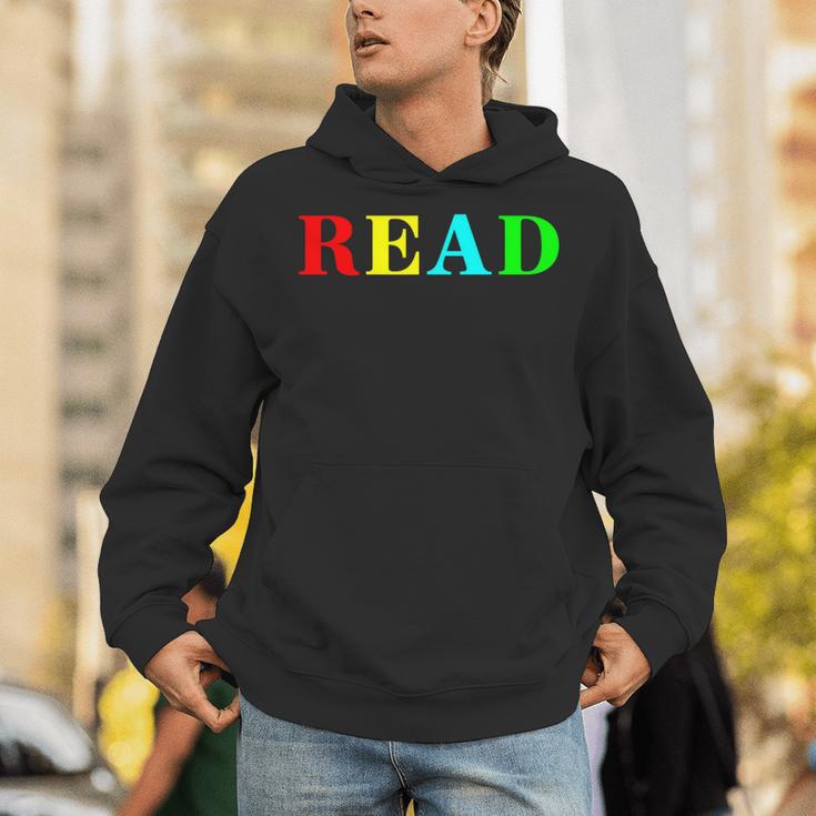 Teacher Reading Read In Color Book Unisex Hoodie Teacher Reading Read In Color Book Unisex Hoodie