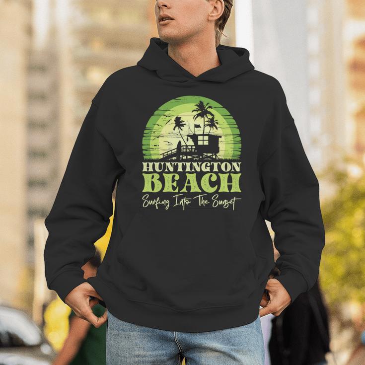 レトロなハンティントンビーチサンセットサーフシーン 長袖tシャツ パーカー