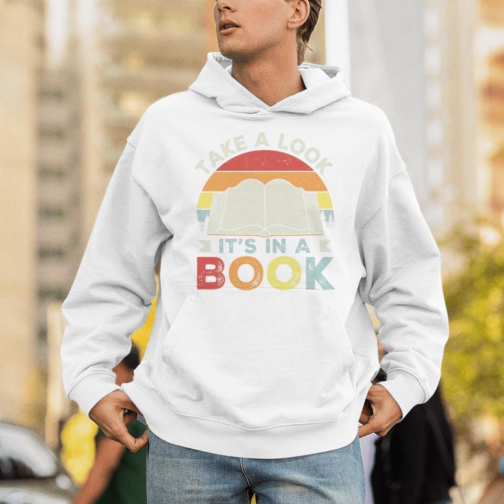 Take A Look It's In A Book Retro Reading Premium Tri-Blend Unisex Hoodie