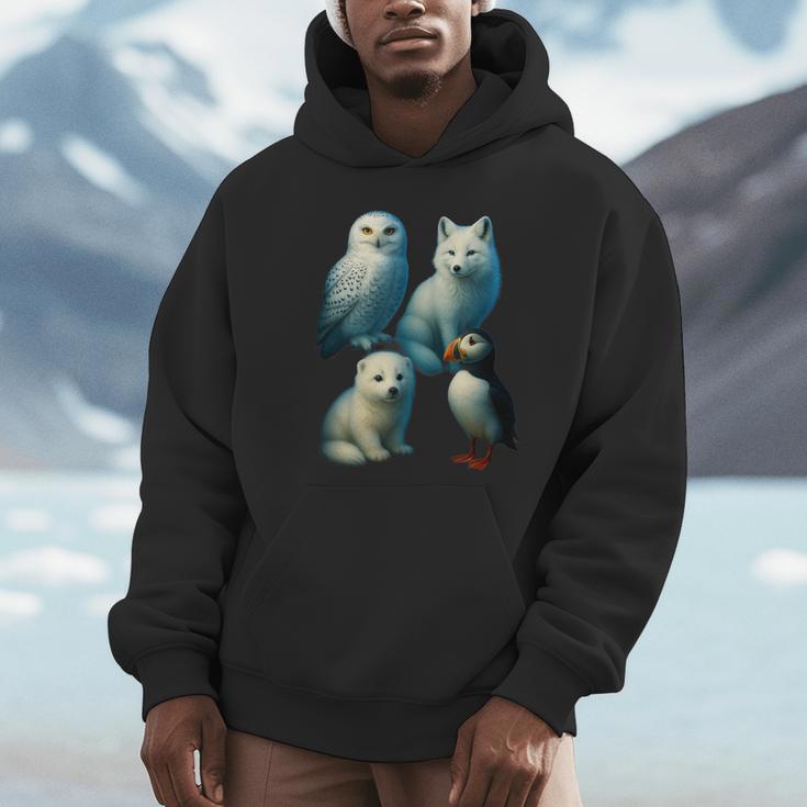 Arctic Animals コラージュ シロフクロウ キツネアザラシ ツノメ パーカー