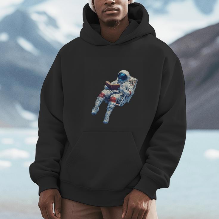 Astronaut Reading Book Sci-Fi Enthusiast Unisex Hoodie Astronaut Reading Book Sci-Fi Enthusiast Unisex Hoodie
