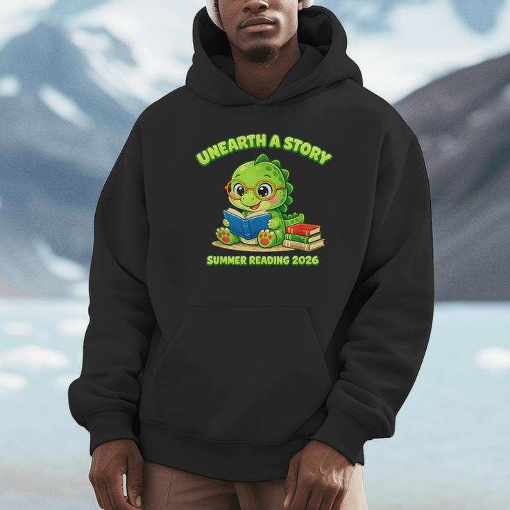 Cute Dino Book Lover Unearth A Story Summer Reading Unisex Hoodie Cute Dino Book Lover Unearth A Story Summer Reading Unisex Hoodie