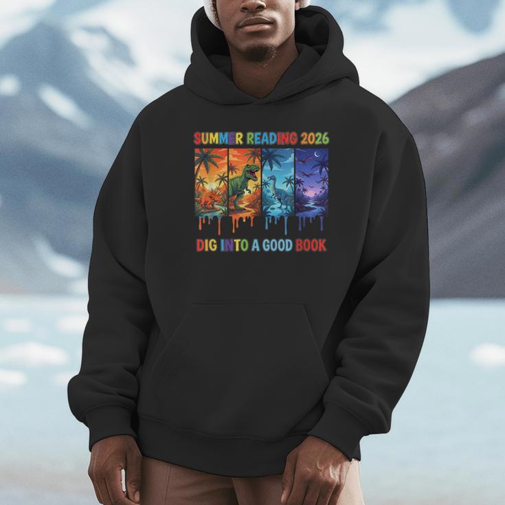 Summer Reading 2026 Unearth A Story Dinosaur Books Unisex Hoodie