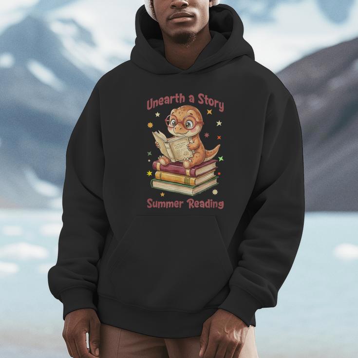 Unearth a Story Summer Reading T-Rex Book Lover Unisex Hoodie Unearth a Story Summer Reading T-Rex Book Lover Unisex Hoodie