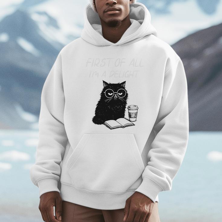 First Of All I’m A Delight Cute Cat Books Coffee Humor Unisex Hoodie First Of All I’m A Delight Cute Cat Books Coffee Humor Unisex Hoodie