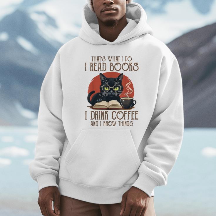 i Read Books And i Know Things Cat Reading Coffee Unisex Hoodie