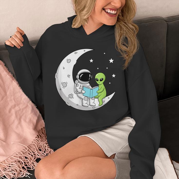 Astronaut And Alien Reading On Moon Space Book Lover Sci Fi Unisex Hoodie Astronaut And Alien Reading On Moon Space Book Lover Sci Fi Unisex Hoodie