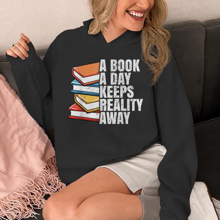 A Book A Day Keeps Reality Away Bookworm Unisex Hoodie