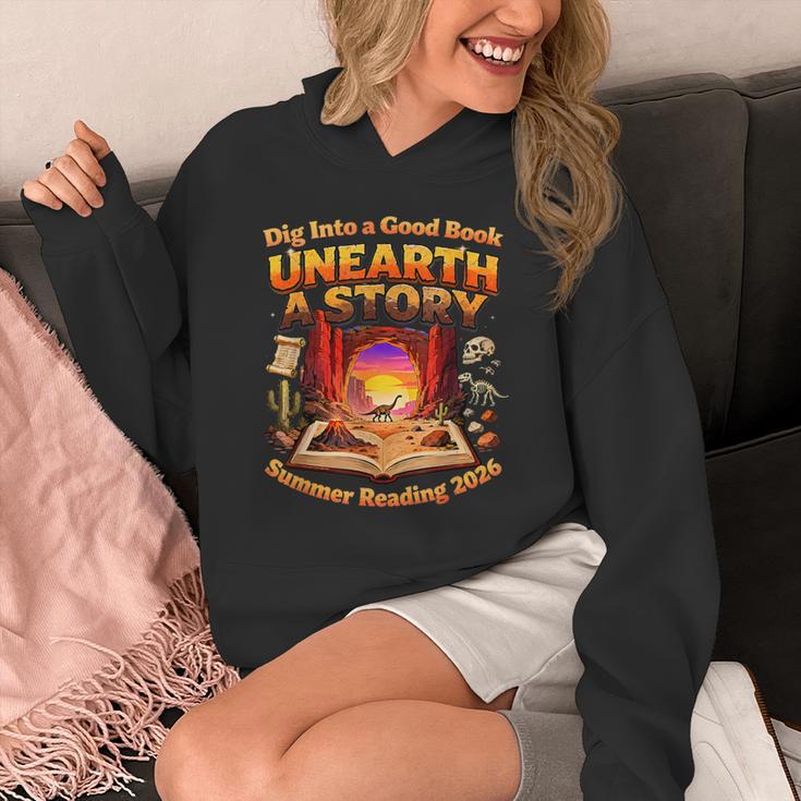 Books Summer Reading 2026 Unearth A Story Dinosaur Unisex Hoodie