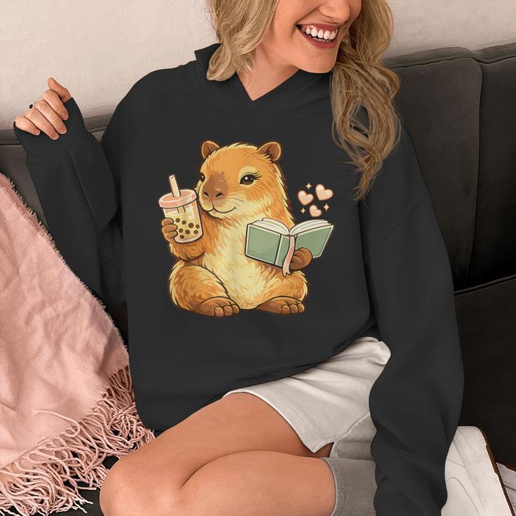 Capybara Reading a Book With Bubble Tea Unisex Hoodie