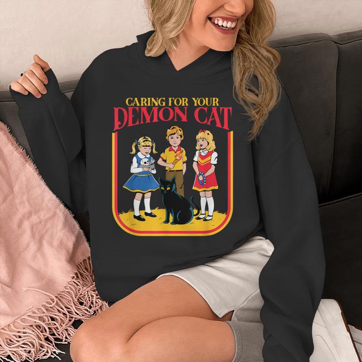 Caring For Your Evil Cat Retro Dark Humor Book Cover Unisex Hoodie