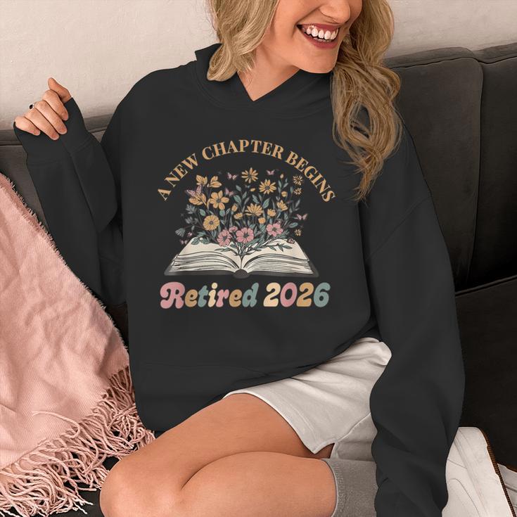A New Chapter Begins Retirement Floral Book Retired 2026 Unisex Hoodie