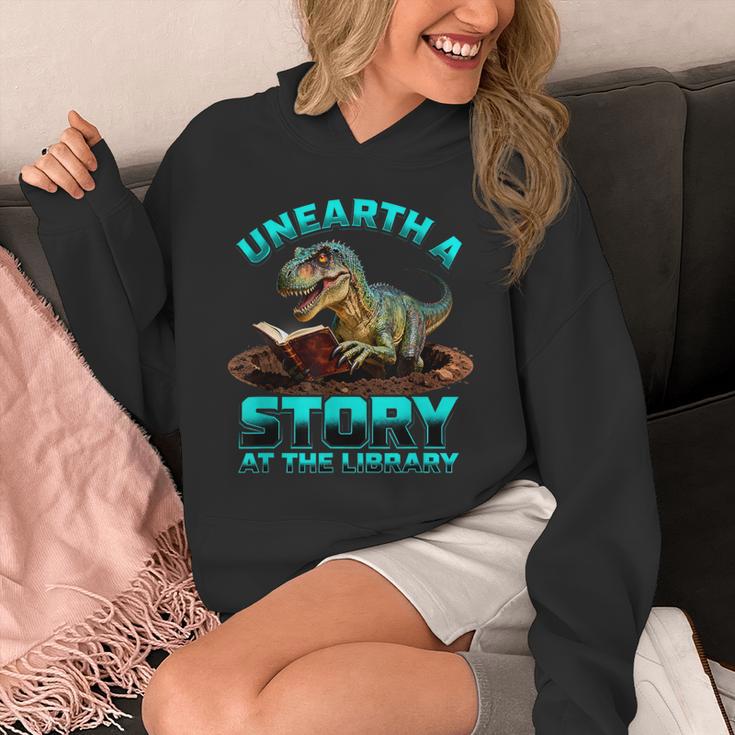 Unearth A Story At The Library Dinosaur Reading Unisex Hoodie