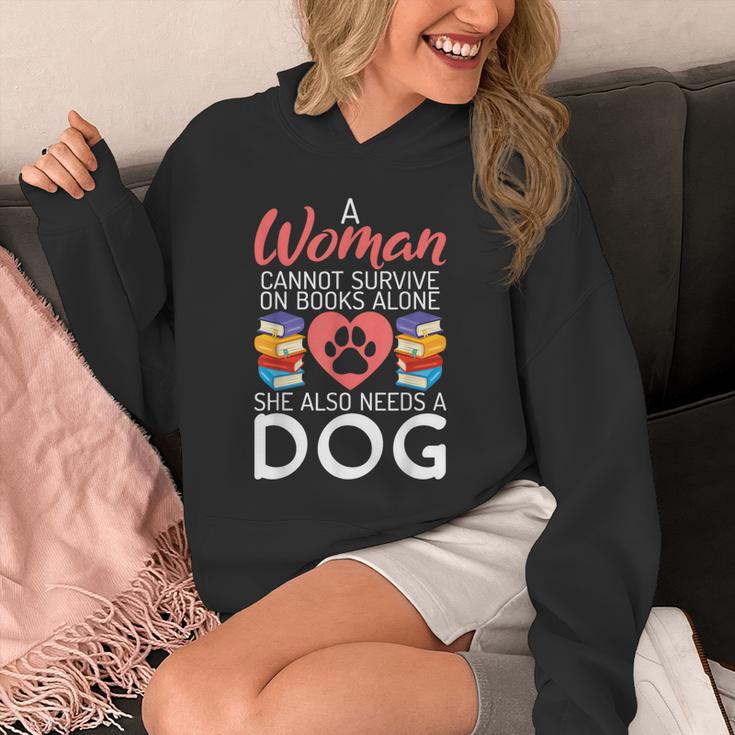 A Woman Cannot Survive On Books Alone She Also Needs a Dog Unisex Hoodie A Woman Cannot Survive On Books Alone She Also Needs a Dog Unisex Hoodie