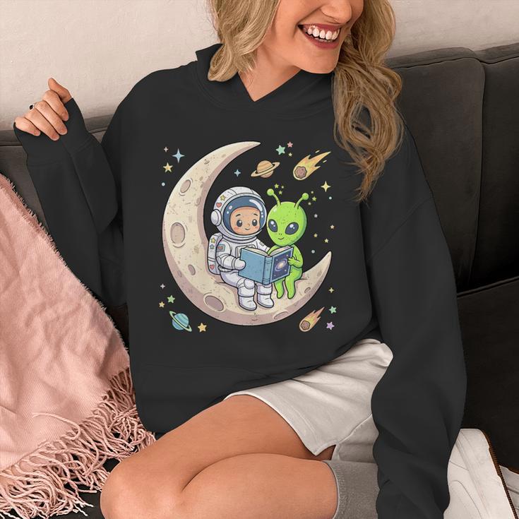 Women's Astronaut Reading Book With Alien Moon Space Astronomy Unisex Hoodie