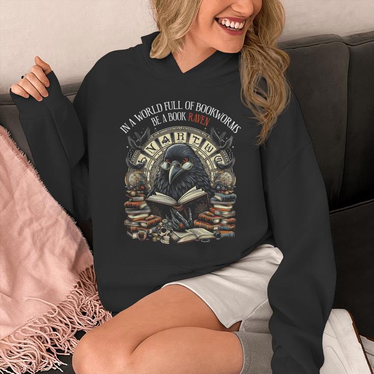 In A World Full Of Bookworms Be A Book Raven Reader Reading Unisex Hoodie