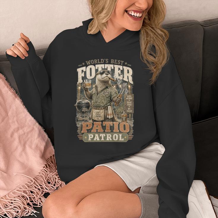 Worlds Best Fotter パティオ パトロール 裏庭 カワウソ しゃれ 誕生日 長袖tシャツ パーカー