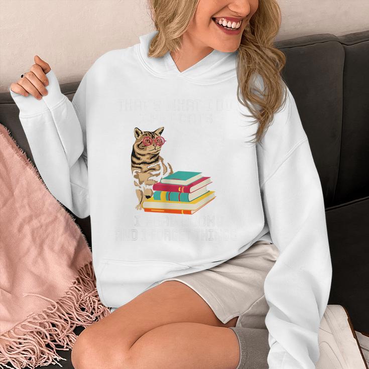 That's What I Do I Pet Cats I Read Books And I Forget Things Unisex Hoodie That's What I Do I Pet Cats I Read Books And I Forget Things Unisex Hoodie