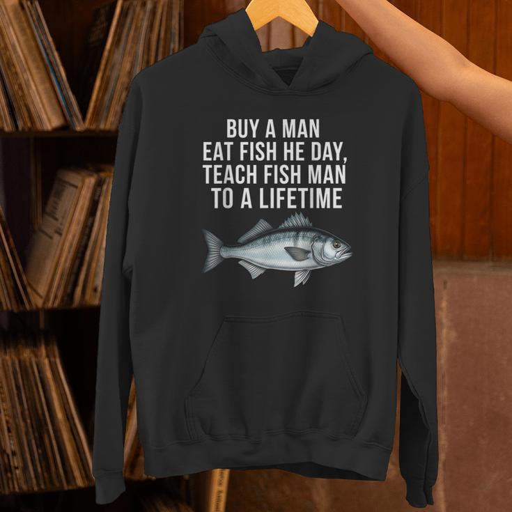Buy A Man Eat Fish He Day Teaching Fish Man To A Lifetime Fish パーカー