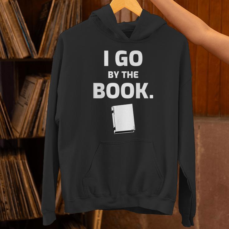 I GO BY THE BOOK Unisex Hoodie
