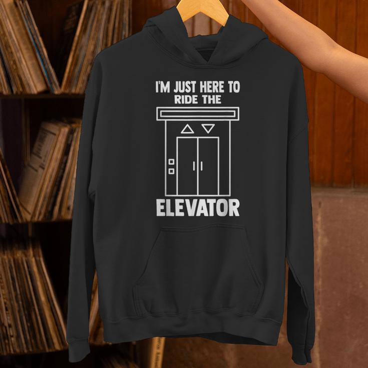 I'm Just Here To Ride The Elevator おもしろ引用エレベーター パーカー