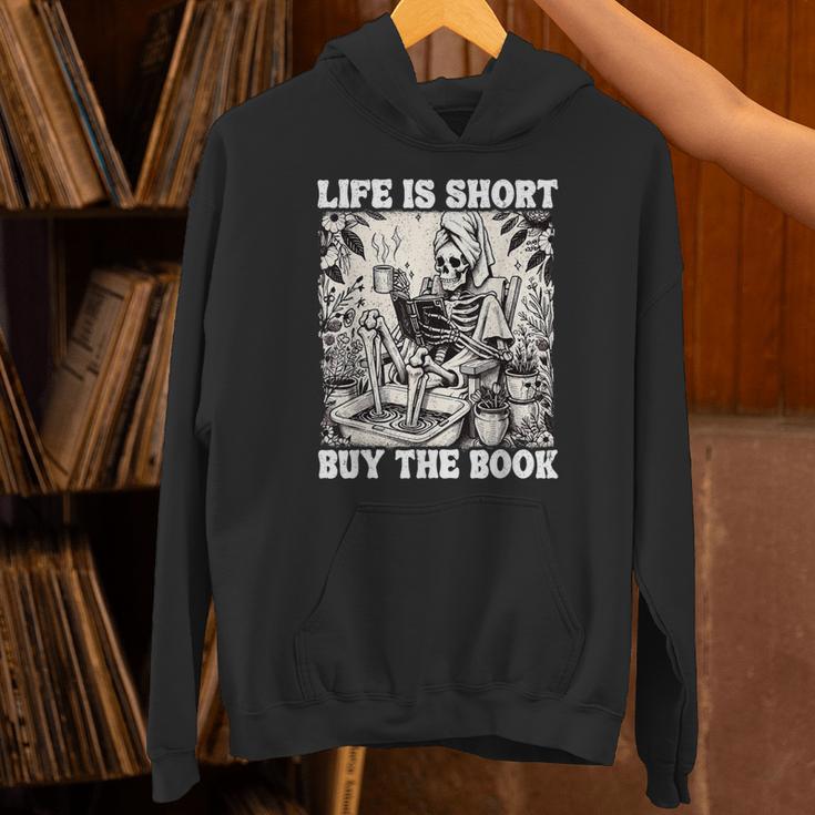Life Is Short Buy The Book Skeleton Book Lover Reading Unisex Hoodie Life Is Short Buy The Book Skeleton Book Lover Reading Unisex Hoodie