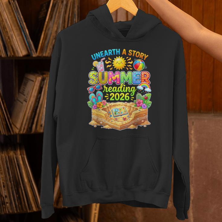 Summer Reading 2026 Unearth a Story Book Reading Unisex Hoodie Summer Reading 2026 Unearth a Story Book Reading Unisex Hoodie