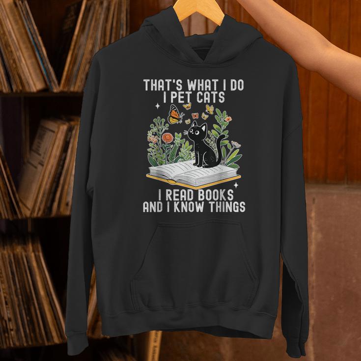 That's What I Do I Pet Cats I Read Books And I Know Things Unisex Hoodie That's What I Do I Pet Cats I Read Books And I Know Things Unisex Hoodie
