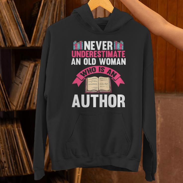 Never Underestimate An Old Woman Author Write Book Unisex Hoodie Never Underestimate An Old Woman Author Write Book Unisex Hoodie