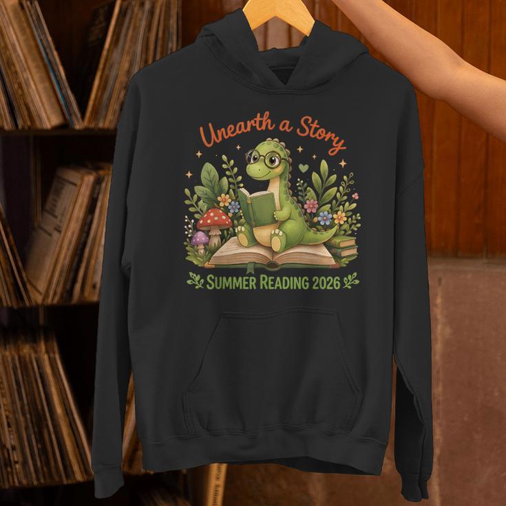 Unearth A Story Summer Reading 2026 Dinosaur Reading Books Unisex Hoodie