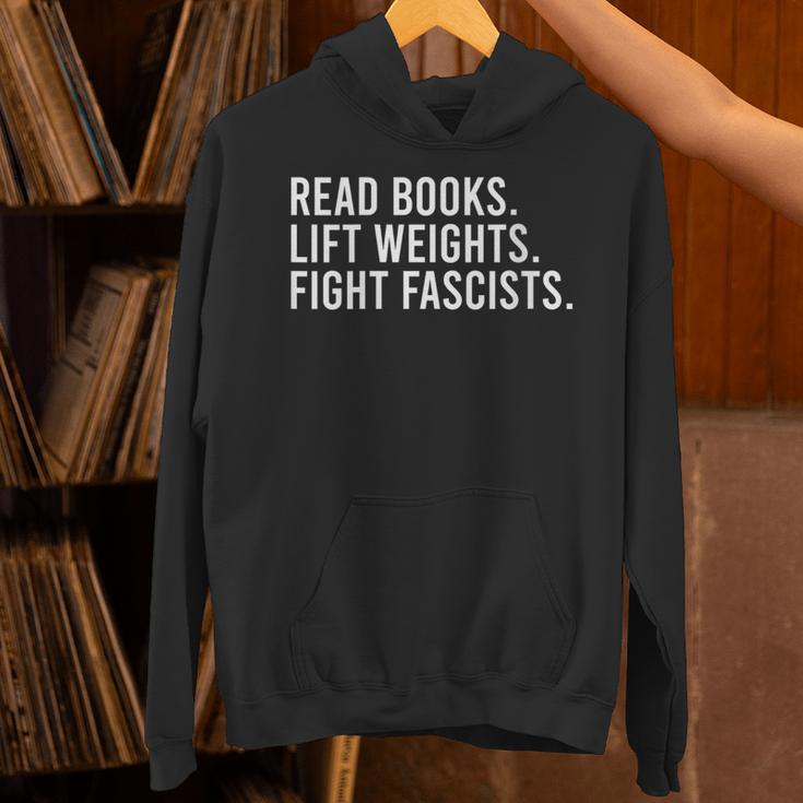 Women's Read Books Lift Weights Fight Fascists Reading Activism Unisex Hoodie