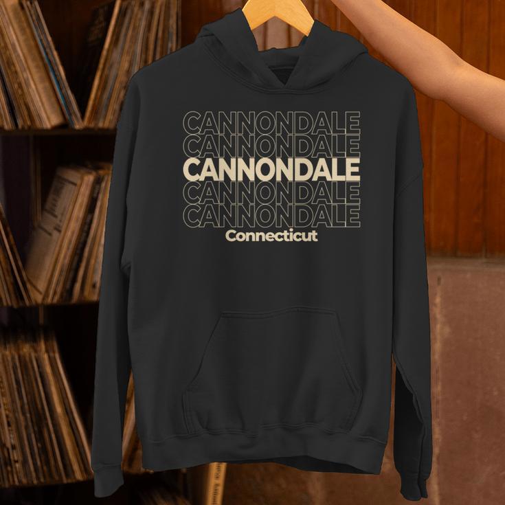 ビンテージキャノンデール、コネチカット州繰り返しテキスト 長袖tシャツ パーカー