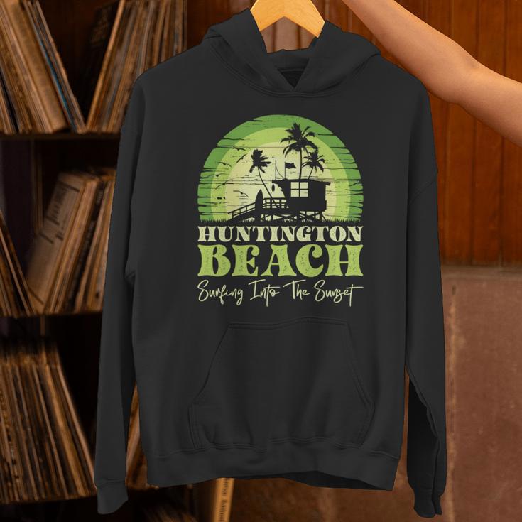 レトロなハンティントンビーチサンセットサーフシーン 長袖tシャツ パーカー