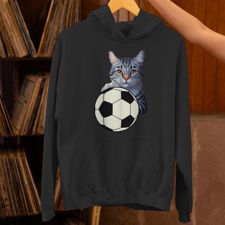 面白い猫サッカーボールグラフィック子猫のスポーツ愛好家のコスチューム パーカー