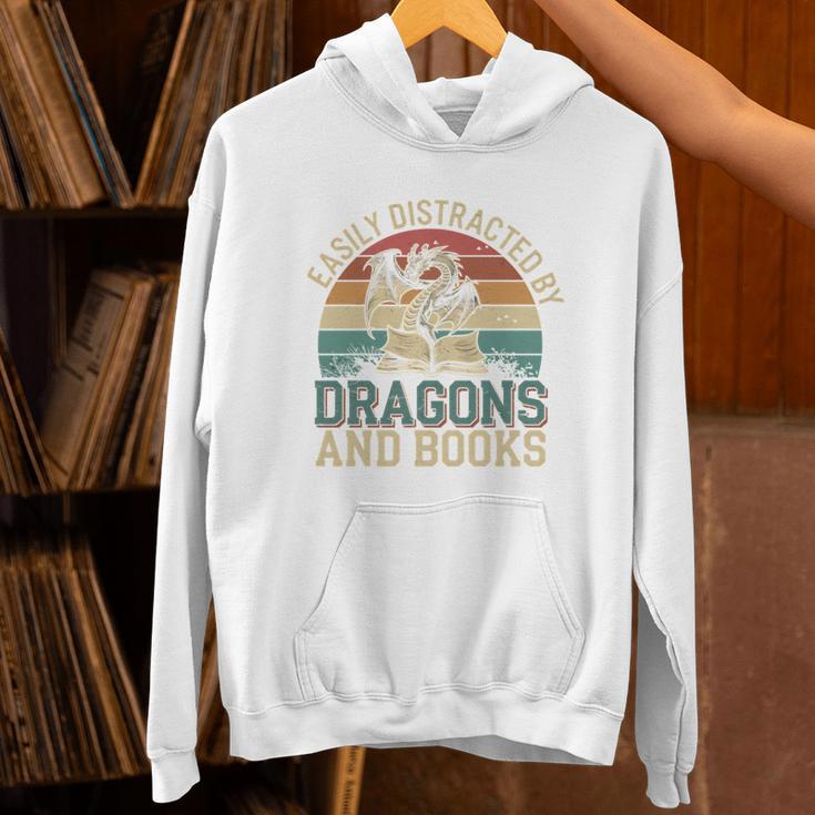 Easily Distracted By Books & Dragons Bookworm Reading Unisex Hoodie Easily Distracted By Books & Dragons Bookworm Reading Unisex Hoodie