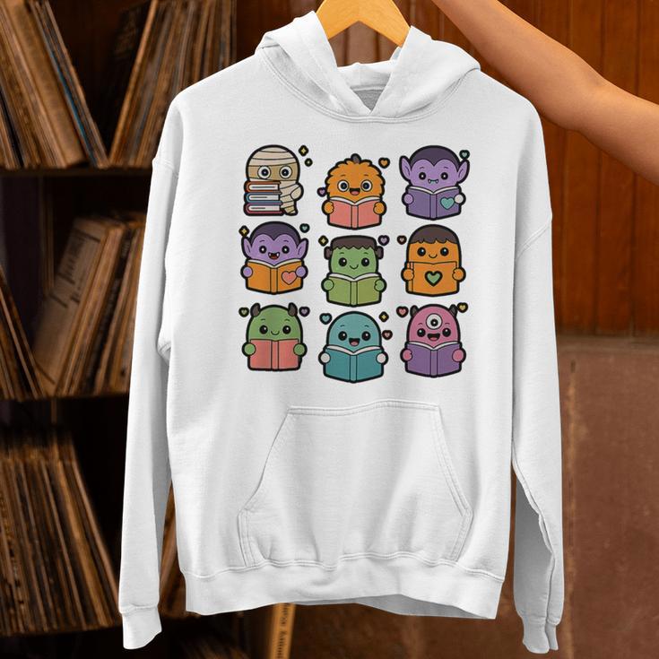 Halloween Monsters Reading Books Pattern Spooky Kawaii Anime Premium Tri-Blend Unisex Hoodie