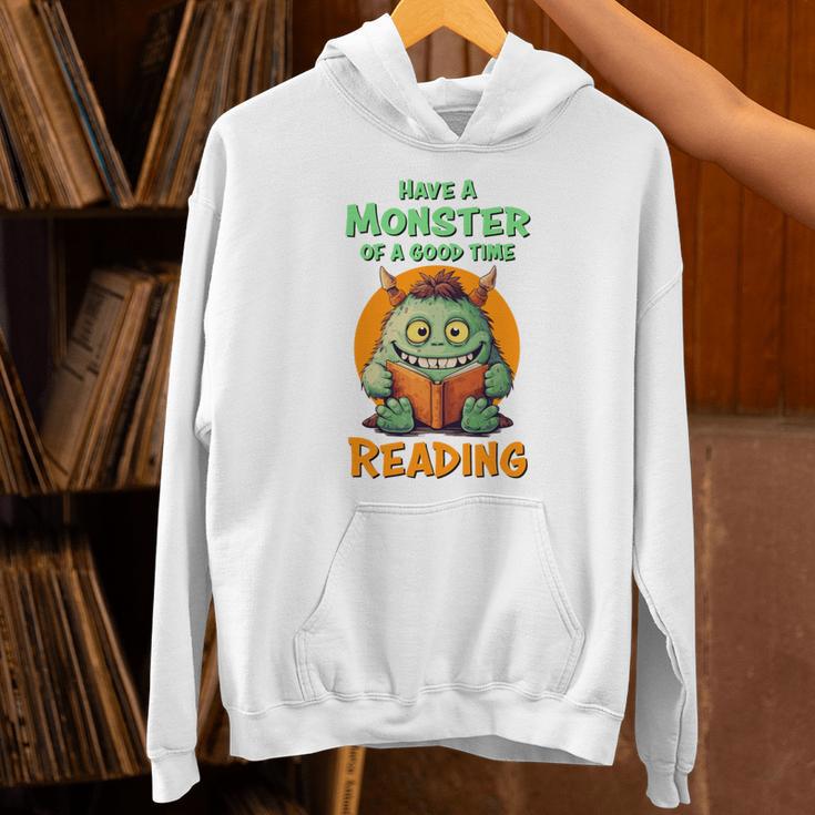 Halloween Teacher Librarian Monster Reading Books Performance Unisex Hoodie Halloween Teacher Librarian Monster Reading Books Performance Unisex Hoodie